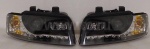ФАРА AUDI A4 (8E2,B6) `01-04 LH+RH черн. линз. ходовые Junyan (тюнинг)